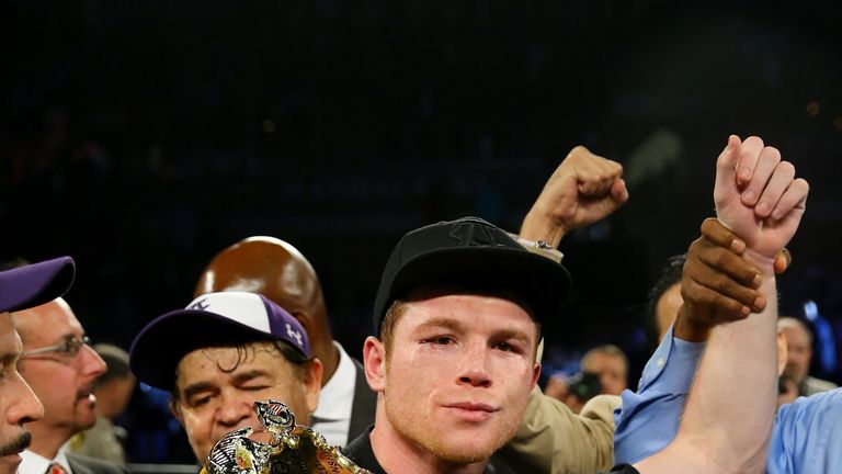 Canelo Alvarez celebrates after defeating Miguel Cotto by unanimous decision in their middleweight fight on November 21, 2015 in Las Vegas, Nevada. 
