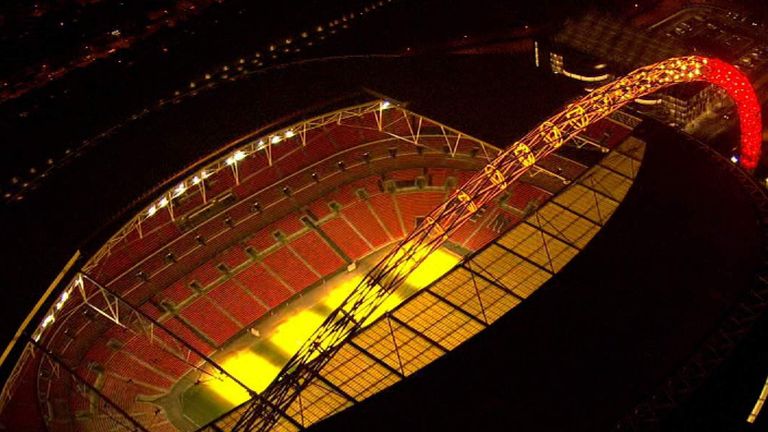 Belgian flag lights Wembley.