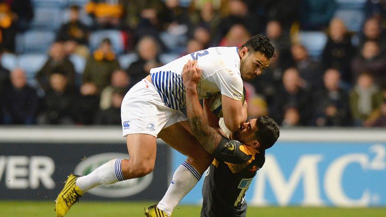 Charles Piutau of Wasps tackles Ben Te'o of Leinster Rugby during the European Rugby Champions Cup match between Wasps and Leinster Rugby at Ricoh Arena