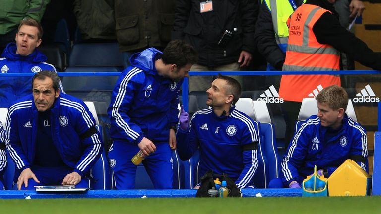 Chelsea physio Jon Fearn (centre right) returns to the bench before the match against West Ham