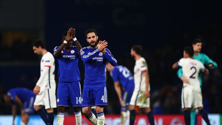  A dejected Cesc Fabregas of Chelsea applauds the home fans