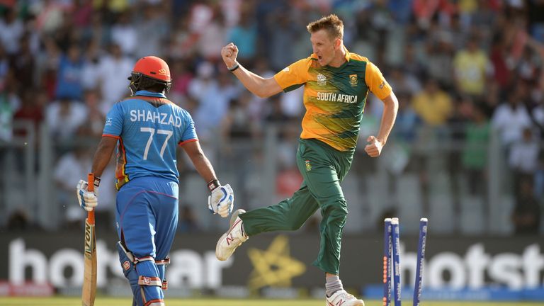 Chris Morris celebrates dismissing Afghanistan opener Mohammad Shahzad