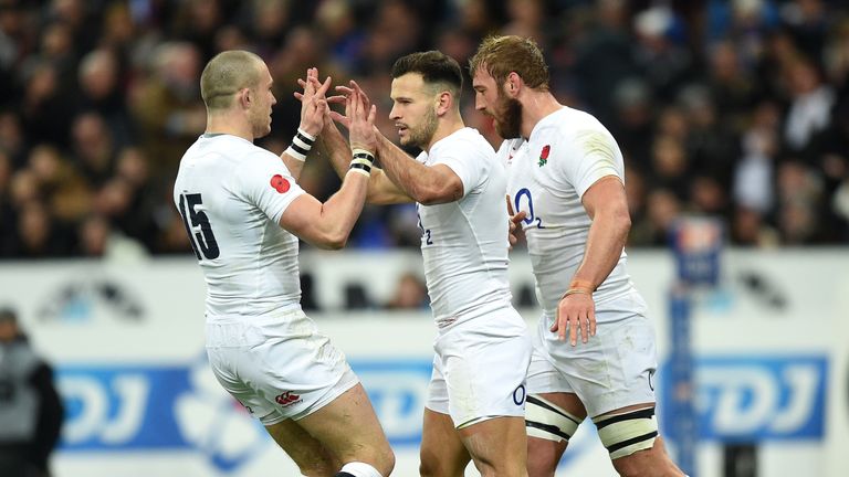 England's Danny Care celebrates scoring his side's first try with Mike Brown (left) and Chris Robshaw