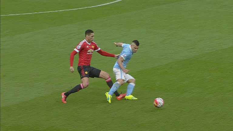 Chris Smalling appeared to go through the back of Aguero