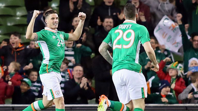 Ciaran Clark (L) celebrates with Republic of Ireland defender Shane Duffy during their win over Switzerland