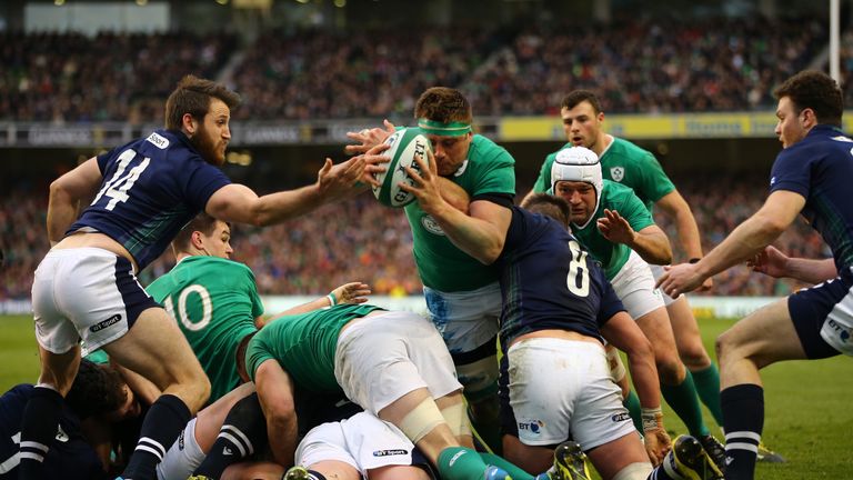  CJ Stander of Ireland dives over a maul to score his team's opening try 