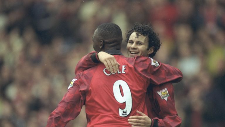 Ryan Giggs (right) and Andy Cole, both of Manchester United, celebrate a goal during the FA Carling Premiership match against Barnsley at Old
