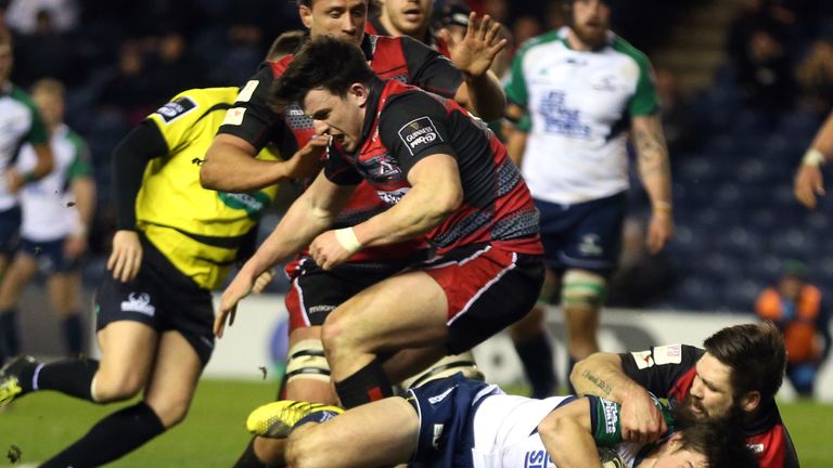 Connacht's AJ MacGinty scores try despite the best efforts of Cornell Du Preez of Edinburgh