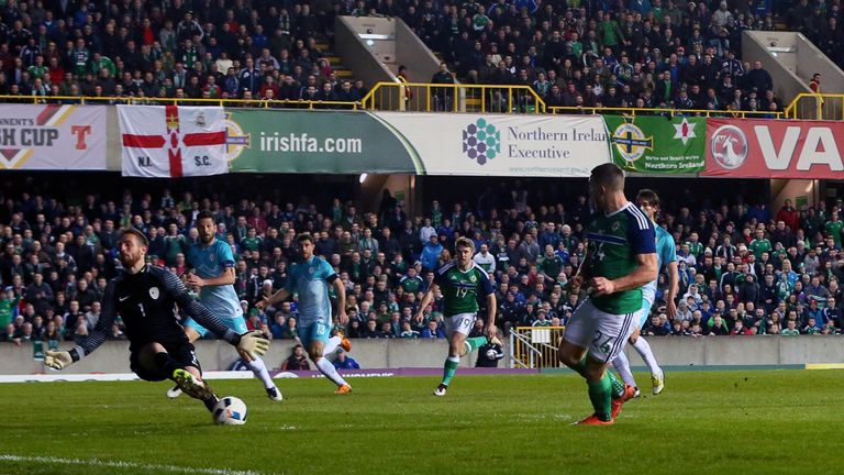 Northern Ireland's Conor Washington takes a shot on goal during an International Friendly at Windsor Park, Belfast