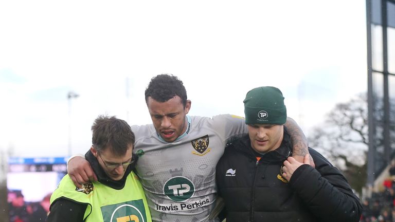 Courtney Lawes of Northammpton is carried off the pitch during the Aviva Premiership match between Saracens and Northampton Saints at Allianz Park