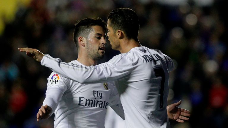 Real Madrid's midfielder Isco (L) celebrates a goal with Cristiano Ronaldo 