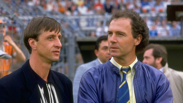 1987:  Franz Beckenbauer (right) of West Germany stands with Johan Cruyff of Holland during the European Championship qualifying match between Holland and 