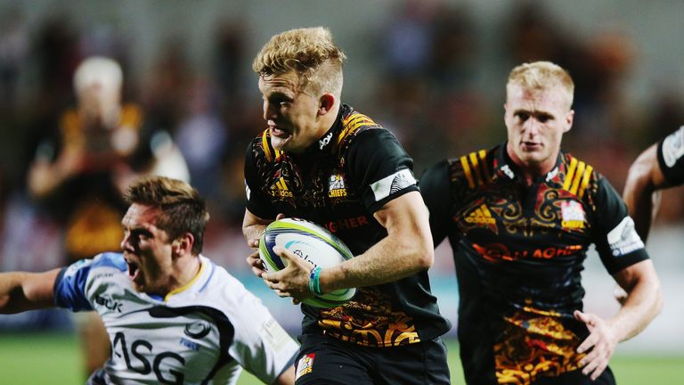 Damian McKenzie of the Chiefs dives over to score a try during the round five Super Rugby match between the Chiefs and the Western Force