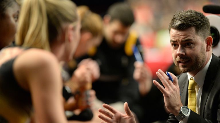 Manchester Thunder's Head Coach Dan Ryan talks tactics with his players during the match against Team Northumbria