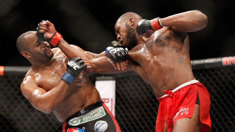 LAS VEGAS, NV - JANUARY 03:  Light heavyweight champion Jon Jones (R) punches Daniel Comier during the UFC 182 event at the MGM Grand Garden Arena on Janua