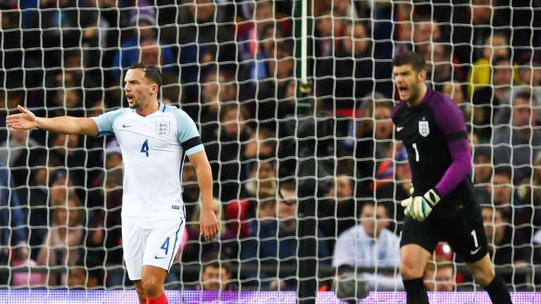 England duo Danny Drinkwater (l) and Fraser Forster appeal following the second Netherlands