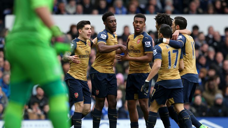 Danny Welbeck (2nd L) of Arsenal celebrates scoring his team's first goal against Everton