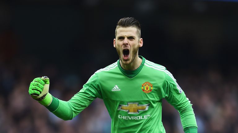 MANCHESTER, ENGLAND - MARCH 20:  David De Gea of Manchester United celebrates as Marcus Rashford of Manchester United scores their first goal during the Ba