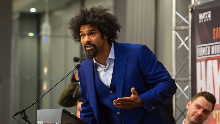 David Haye reacts as US Boxer Shannon Briggs (not pictured) interrupts a press conference at Grosvenor House, London.