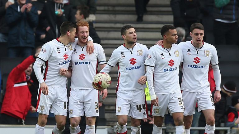 Dean Lewington of Milton Keynes Dons celebrates scoring their first goal during the Sky Bet Championship match between 