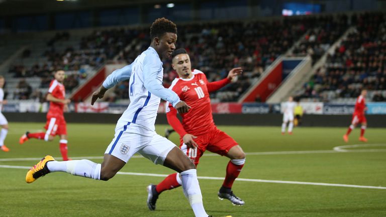 THUN, SWITZERLAND - MARCH 26: Demarai Gray of England U21 (L) fights for the ball with Musa Araz of Switzerland U21 during the European Under 21 Qualifier 