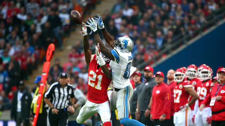 LONDON, ENGLAND - NOVEMBER 01:  Sean Smith #21 of the  Kansas City Chiefs challenges for the ball with  Calvin Johnson #81 of the Detroit Lions during the 