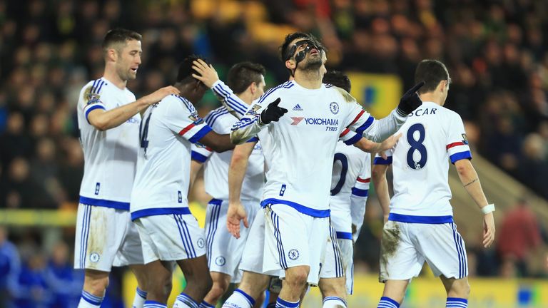 Diego Costa (centre) of Chelsea celebrates scoring his team's second goal against Norwich