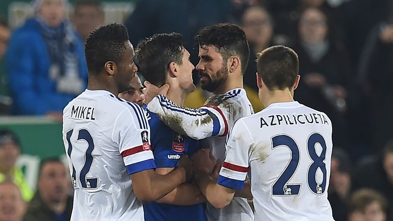 Diego Costa clashes with Gareth Barry clash in the incident leading to Costa's second yellow card 