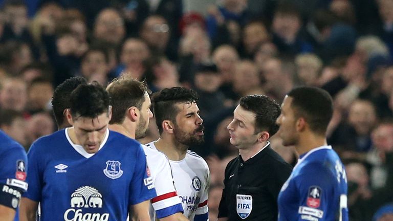 Chelsea's Diego Costa is shown the red card by referee Michael Oliver after a altercation with Everton's Gareth Barry (18) during the Emirates FA Cup, Quar