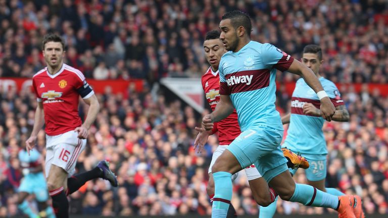 Jesse Lingard of Manchester United in action with Dimitri Payet of West Ham United