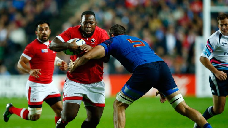 Djustice Sears-Duru of Canada is tackled by Yoann Maestri of France during their 2015 Rugby World Cup Pool D match.