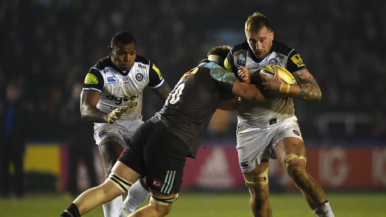 LONDON, ENGLAND - MARCH 11:  Dominic Day of Bath is tackled during the Aviva Premiership match between Harlequins and Bath at Twickenham Stoop on March 11,