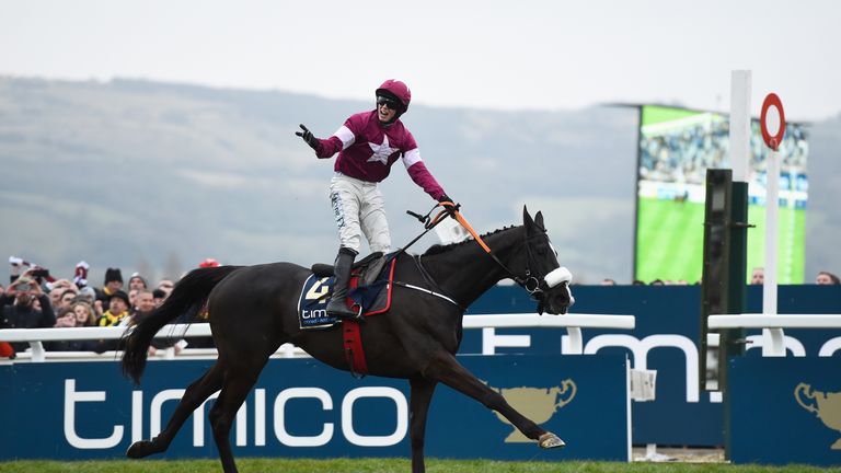 Bryan Cooper on Don Cossack celebrates victory after winning the Timico Cheltenham Gold Cup