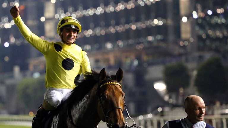 Andrea Atzeni celebrates after leading Postponed to win the Dubai Sheema Classic