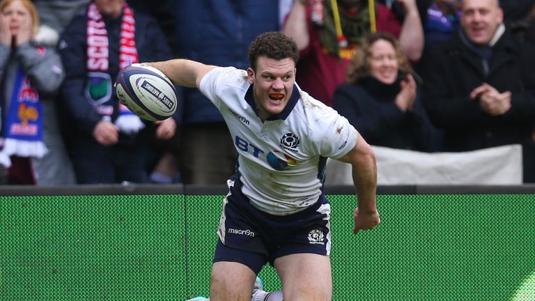 Duncan Taylor of Scotland celebrates after scoring his team's second try during the RBS Six Nations match between Scotland and France