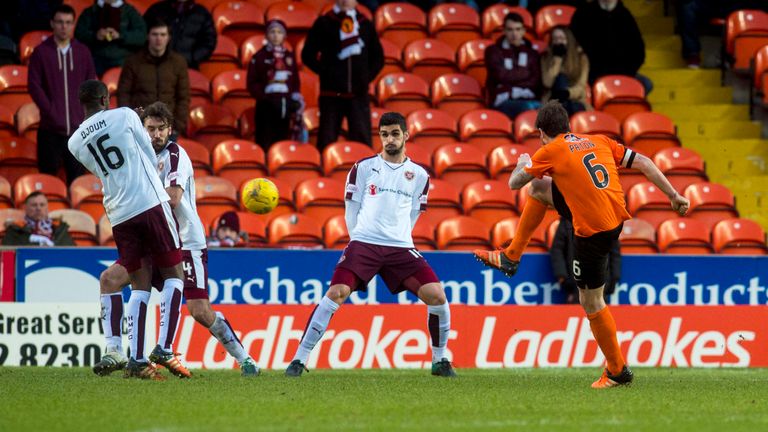 Dundee Utd's Paul Paton (right) scores his side's winning goal against Hearts