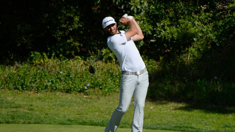 Dustin Johnson tees off on the 13th hole during the final round of the Northern Trust Open at Riviera Country Club 