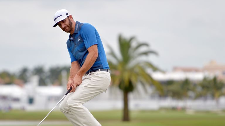  Dustin Johnson reacts to a missed birdie putt on the 10th hole during the third round of the World Golf Championships-Cadillac Championship 