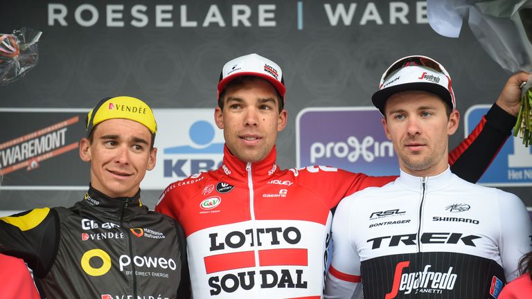 (From L) Second-placed French cyclist Bryan Coquard, winner Belgian cyclist Jens Debusschere and third-placed Belgian cyclist Edward Theuns