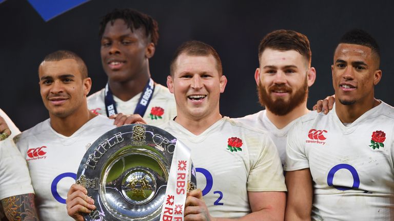  Dylan Hartley of England celebrates with the Triple Crown trophy after the RBS Six Nations match between England and Wales at Twickenham Stadium