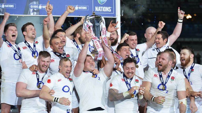 Dylan Hartley of England lifts the RBS Six Nations trophy after England won the Grand Slam 