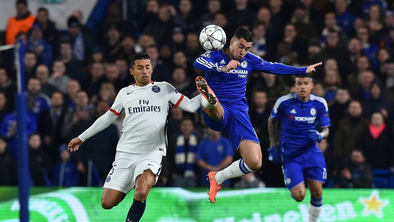 Paris Saint-Germain's Brazilian defender Marquinhos (L) vies with Chelsea's Belgian midfielder Eden Hazard (R)
