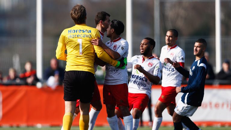 Van der Sar is mobbed by Noordwijk teammates after saving a penalty
