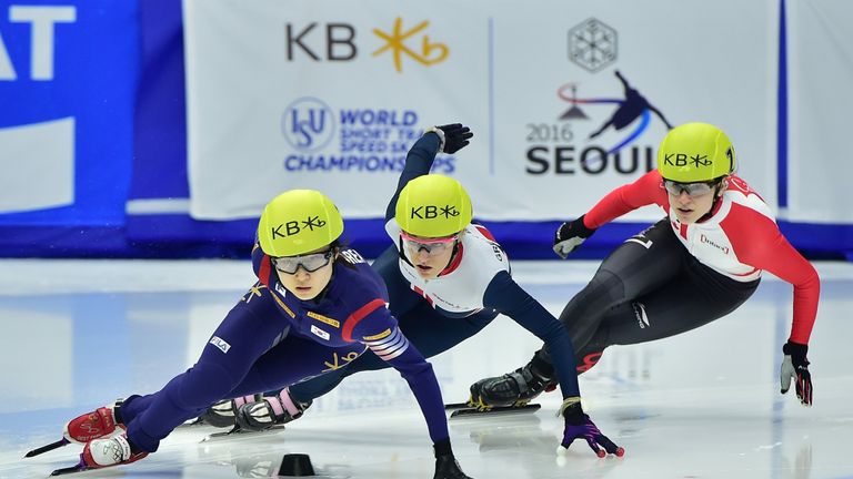 Elise Christie (c) finished second behind Min-Jeong Choi (l) in Seoul