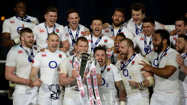 England celebrate with the Six Nations trophy 