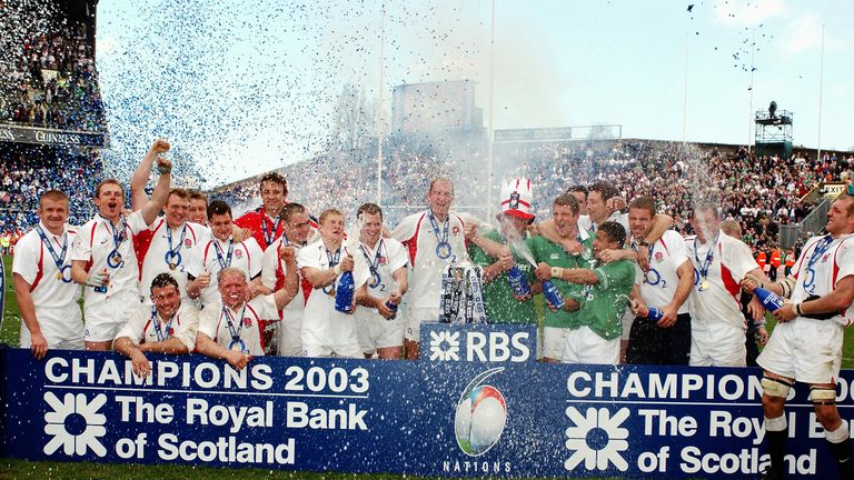 The England players celebrate winning the Grand Slam after the RBS Six Nations Championship match between Ireland and England