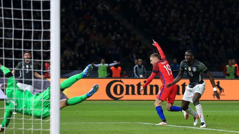 England's Jamie Vardy (second right) turns to celebrate scoring their second goal of the game 