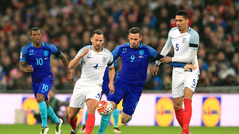England's Daniel Drinkwater (left) and Netherland's Vincent Janssen (right) battle for the ball during the International Friendly match at Wembley Stadium