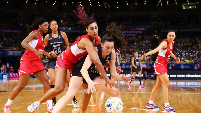 Bailey Mes of New Zealand is challenged by Geva Mentor of England during the 2015 Netball World Cup Semi Final