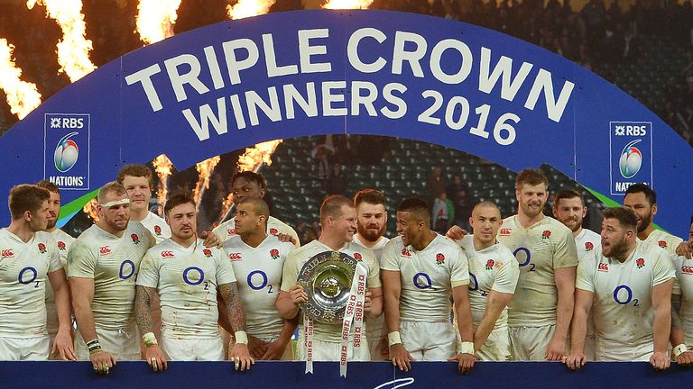 England captain hooker Dylan Hartley holds the Triple Crown trophy following the Six Nations win over Wales